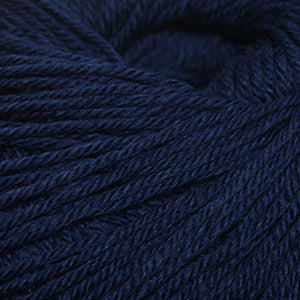 100g skein of worsted weight superwash wool yarn in Midnight Heather dark blue