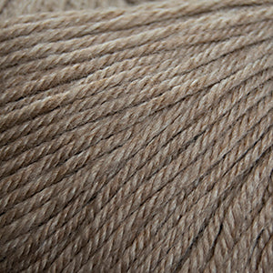 100g skein of worsted weight superwash wool yarn in Doeskin Heather tan