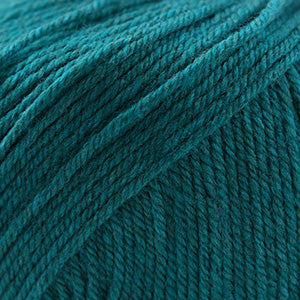 100g skein of worsted weight superwash wool yarn in Pacific teal