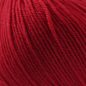 100g skein of worsted weight superwash wool yarn in Really Red