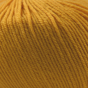 100g skein of worsted weight superwash wool yarn in Golden yellow