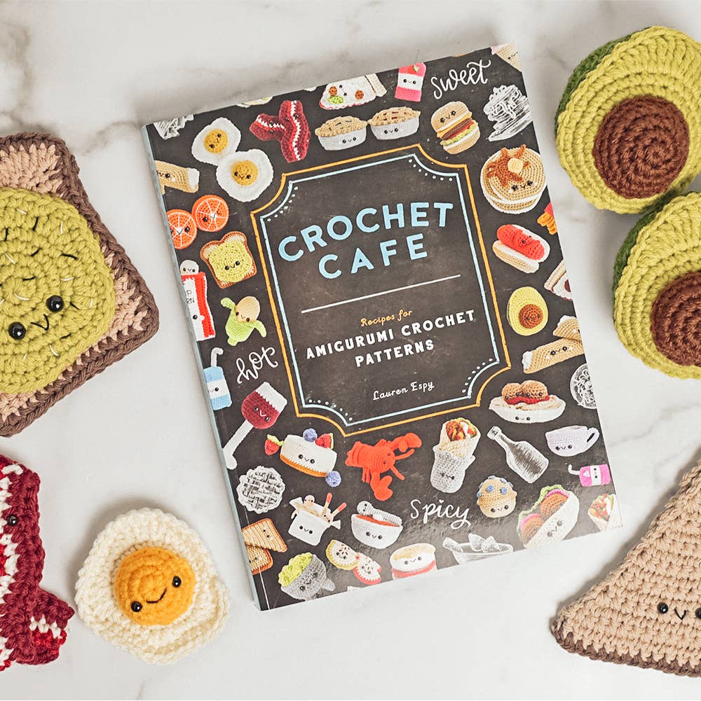 Crochet Cafe book with sample amigurumi including avocado, avocado toast, bacon, fried egg, and pita
