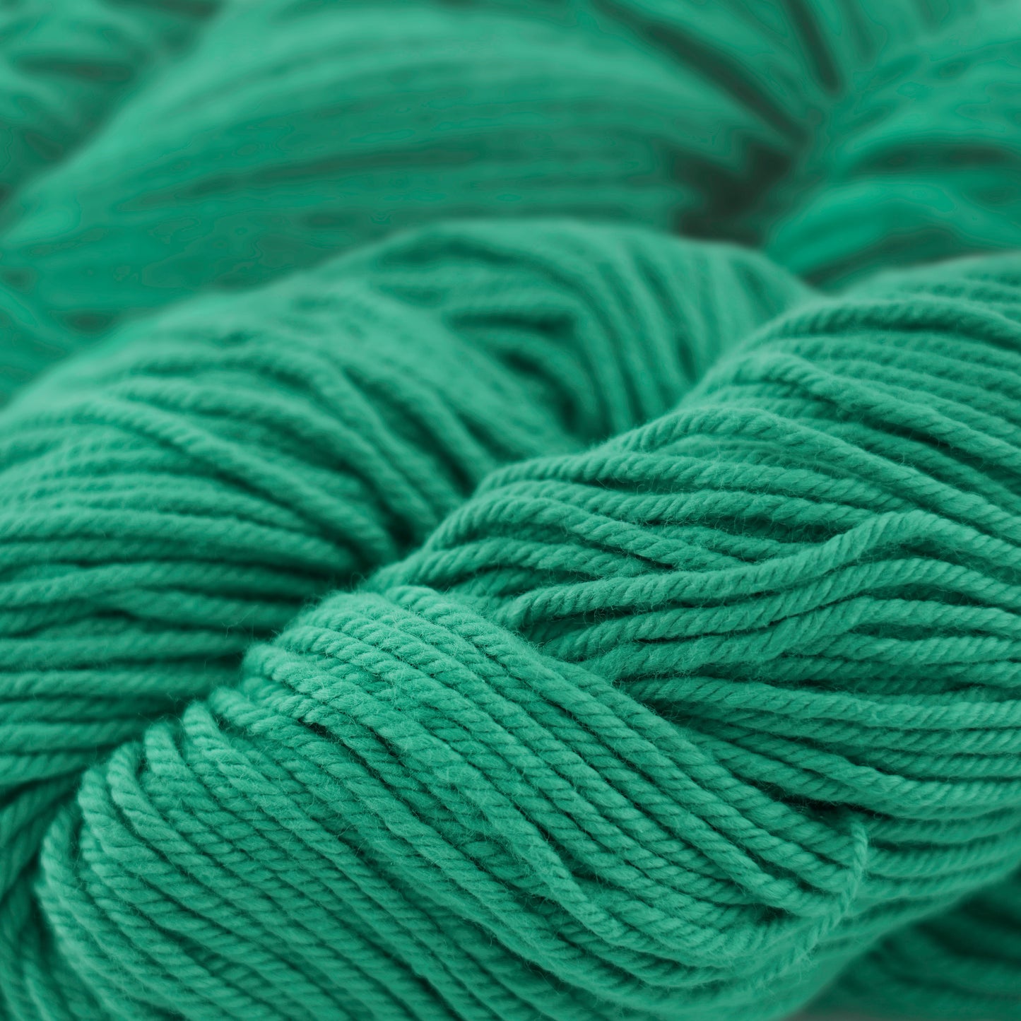 100g skein of worsted weight cotton yarn in Sea Green teal
