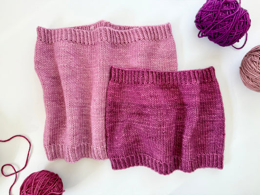 Two cowls made in DK weight yarn using Doodle standard cowl pattern in two sizes