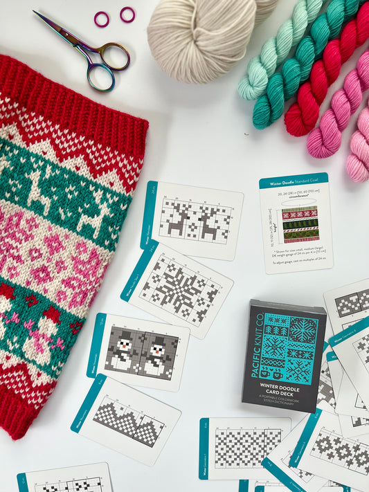 Winter Doodle Deck finished cowl with pattern cards used next to it