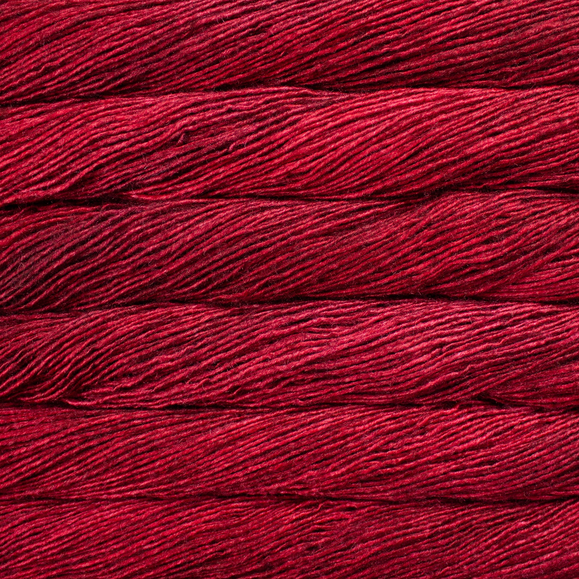 50g skein of silk/merino single ply yarn in Cereza red hand dyed